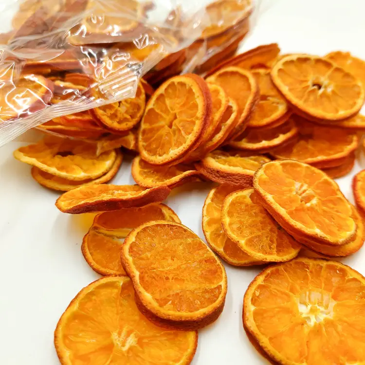Suszone mandarynki plastry zblizenie.png